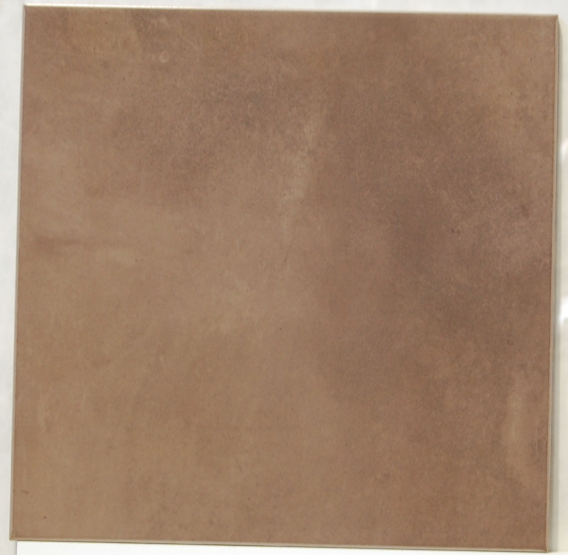 poma131 Navarti Limestone Moka 33x33 padlólap - Image 1